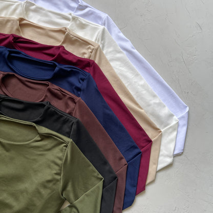 Body manga larga cuello redondo